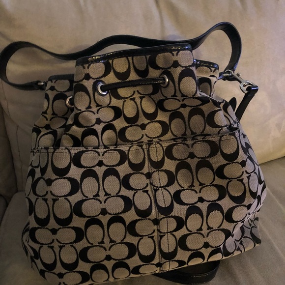 Beautiful drawstring coach purse never worn - Picture 3 of 4